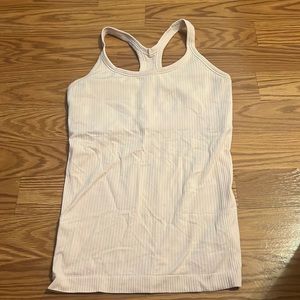 Pink lululemon tank top with built in bra.